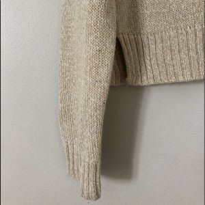 (H&M) cream colored sweater.